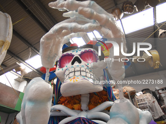 Workers of the 'Taller el Volador' made  the manufacture of skulls and catrinas that will be used for the Day of the Dead Parade inspired by...