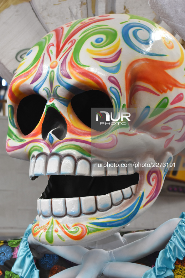 Workers of the 'Taller el Volador' made  the manufacture of skulls and catrinas that will be used for the Day of the Dead Parade inspired by...