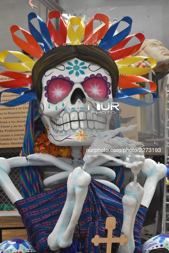 Workers of the 'Taller el Volador' made  the manufacture of skulls and catrinas that will be used for the Day of the Dead Parade inspired by...