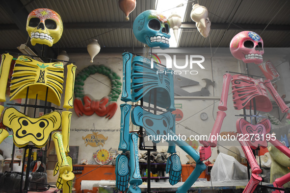 Workers of the 'Taller el Volador' made  the manufacture of skulls and catrinas that will be used for the Day of the Dead Parade inspired by...