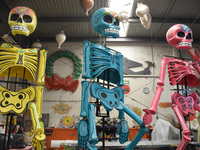 Workers of the 'Taller el Volador' made  the manufacture of skulls and catrinas that will be used for the Day of the Dead Parade inspired by...