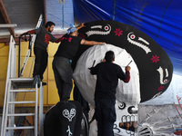 Workers of the 'Taller el Volador' made  the manufacture of skulls and catrinas that will be used for the Day of the Dead Parade inspired by...