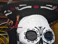 Workers of the 'Taller el Volador' made  the manufacture of skulls and catrinas that will be used for the Day of the Dead Parade inspired by...