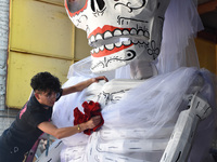 Workers of the 'Taller el Volador' made  the manufacture of skulls and catrinas that will be used for the Day of the Dead Parade inspired by...