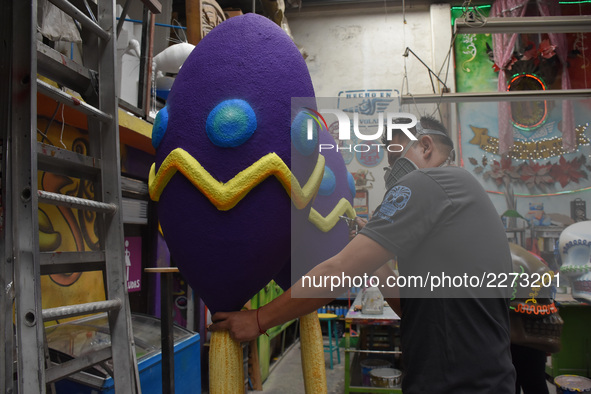 Workers of the 'Taller el Volador' made  the manufacture of skulls and catrinas that will be used for the Day of the Dead Parade inspired by...