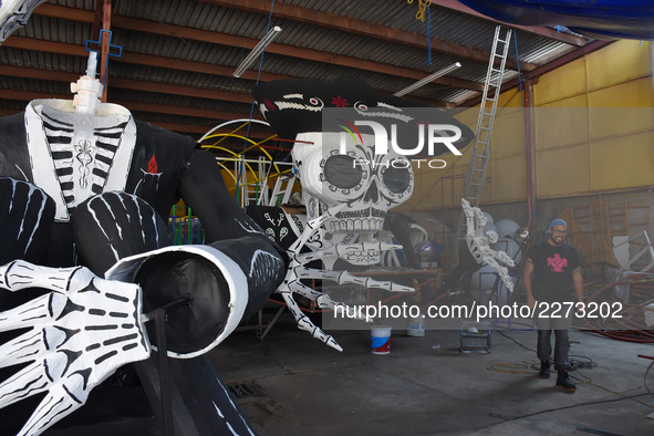 Workers of the 'Taller el Volador' made  the manufacture of skulls and catrinas that will be used for the Day of the Dead Parade inspired by...