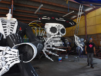 Workers of the 'Taller el Volador' made  the manufacture of skulls and catrinas that will be used for the Day of the Dead Parade inspired by...