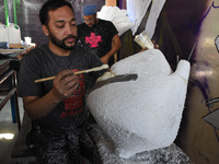 Workers of the 'Taller el Volador' made  the manufacture of skulls and catrinas that will be used for the Day of the Dead Parade inspired by...