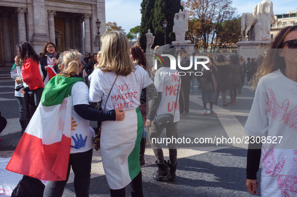 Teachers of the early childhood sector in Roma, protest at the piazza del campidoglio by chained up at the Marc aurel statue  against labour...