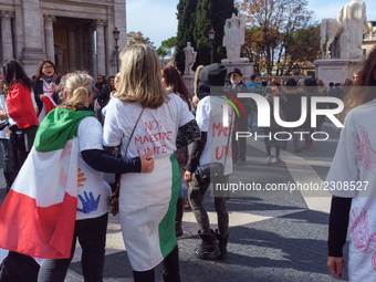 Teachers of the early childhood sector in Roma, protest at the piazza del campidoglio by chained up at the Marc aurel statue  against labour...