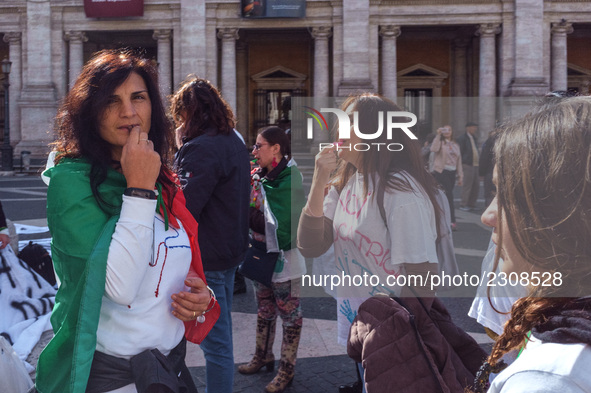 Teachers of the early childhood sector in Roma, protest at the piazza del campidoglio by chained up at the Marc aurel statue  against labour...