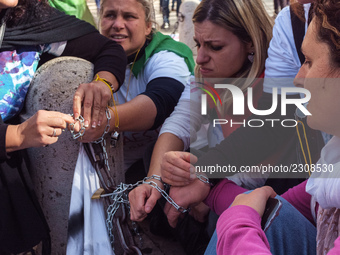 Teachers of the early childhood sector in Roma, protest at the piazza del campidoglio by chained up at the Marc aurel statue  against labour...