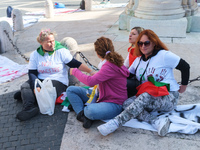 Teachers of the early childhood sector in Roma, protest at the piazza del campidoglio by chained up at the Marc aurel statue  against labour...