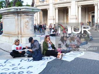 Teachers of the early childhood sector in Roma, protest at the piazza del campidoglio by chained up at the Marc aurel statue  against labour...