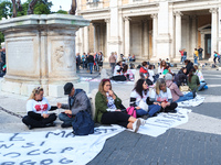 Teachers of the early childhood sector in Roma, protest at the piazza del campidoglio by chained up at the Marc aurel statue  against labour...