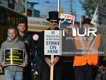 Members of N.B.R.U. (National Bus & Rail Union) , T.E.E.U. (Technical Engineering & Electrical Union) and SIPTU (ervices Industrial Professi...