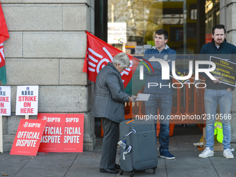 Members of N.B.R.U. (National Bus & Rail Union) , T.E.E.U. (Technical Engineering & Electrical Union) and SIPTU (ervices Industrial Professi...