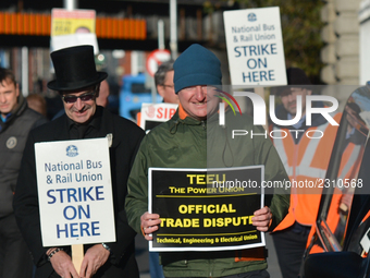 Members of N.B.R.U. (National Bus & Rail Union) , T.E.E.U. (Technical Engineering & Electrical Union) and SIPTU (ervices Industrial Professi...