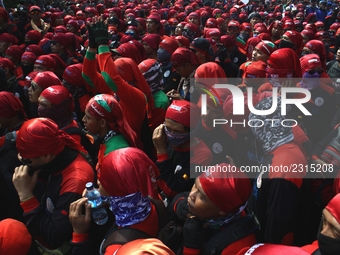 Thousands of workers surrounded the Jakarta Governor's office during a demonstration against the 2018 Regional Minimum Wage (UMP) award at J...