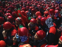 Thousands of workers surrounded the Jakarta Governor's office during a demonstration against the 2018 Regional Minimum Wage (UMP) award at J...