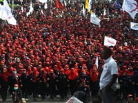 Thousands of workers surrounded the Jakarta Governor's office during a demonstration against the 2018 Regional Minimum Wage (UMP) award at J...