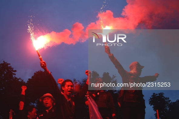 Thousands of workers surrounded the Jakarta Governor's office during a demonstration against the 2018 Regional Minimum Wage (UMP) award at J...