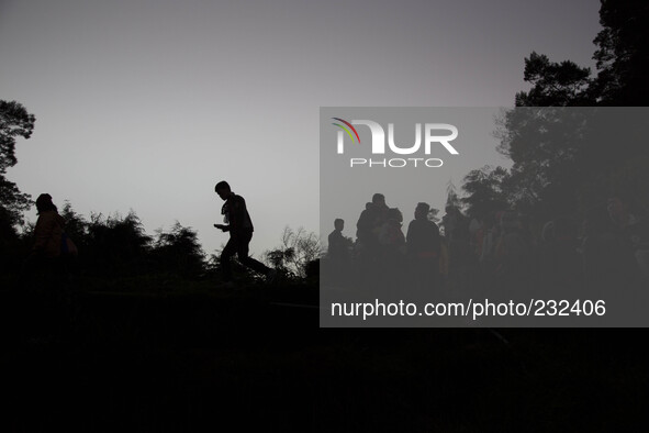 As part of Dieng Festival to see sunrise at the top of Sikunir Mountain in Dieng, people climb the mountain since early morning, almost toal...