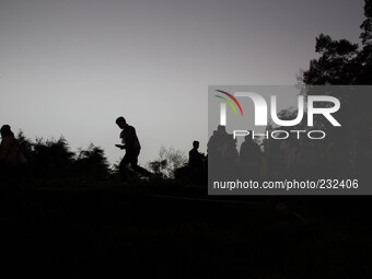 As part of Dieng Festival to see sunrise at the top of Sikunir Mountain in Dieng, people climb the mountain since early morning, almost toal...