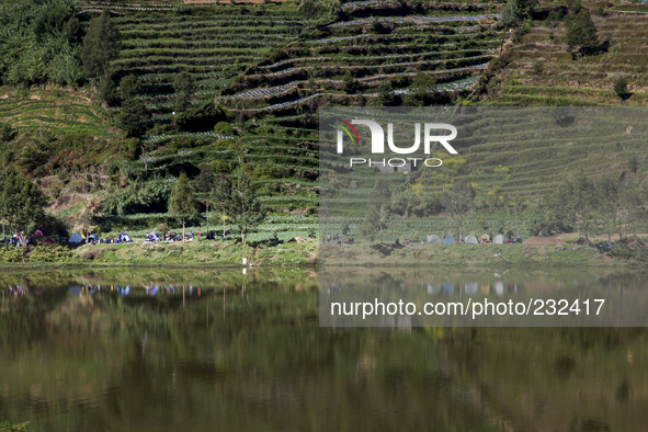 Visitors campsite at the bottom of Sikunir Mountain at Dieng. Dieng plateau in Central Java, is part of the district of Banjarnegara and Won...