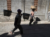 Farmers on their way to their potatoes farm at Dieng. Dieng plateau in Central Java, is part of the district of Banjarnegara and Wonosobo re...