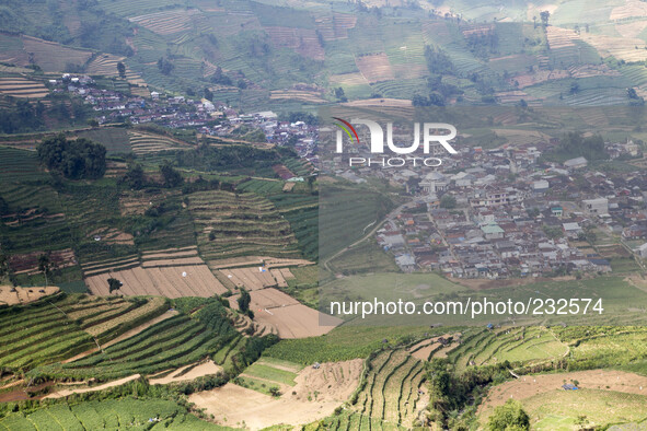 Dieng village view from the high. Dieng plateau in Central Java, is part of the district of Banjarnegara and Wonosobo regency. It lies to th...