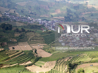 Dieng village view from the high. Dieng plateau in Central Java, is part of the district of Banjarnegara and Wonosobo regency. It lies to th...