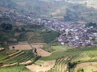 Dieng village view from the high. Dieng plateau in Central Java, is part of the district of Banjarnegara and Wonosobo regency. It lies to th...