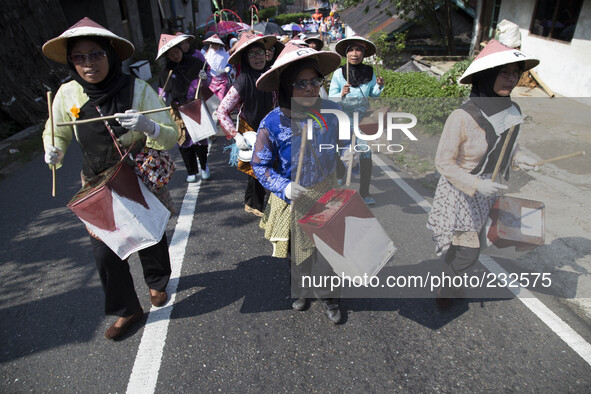 Carnaval festival held by dieng villagers. Dieng plateau in Central Java, is part of the district of Banjarnegara and Wonosobo regency. It l...