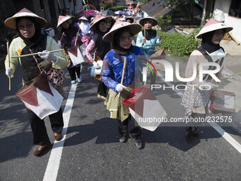 Carnaval festival held by dieng villagers. Dieng plateau in Central Java, is part of the district of Banjarnegara and Wonosobo regency. It l...