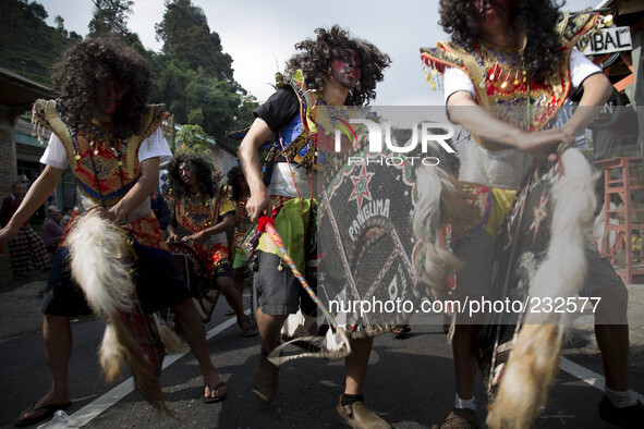 Gimbal Dancer (people with long hair in curly) dance during the villagers karnaval at Dieng. Dieng plateau in Central Java, is part of the d...