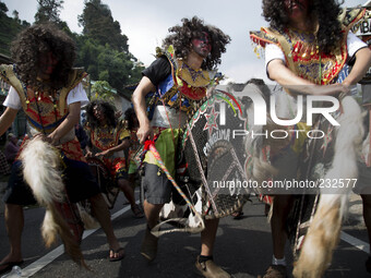 Gimbal Dancer (people with long hair in curly) dance during the villagers karnaval at Dieng. Dieng plateau in Central Java, is part of the d...