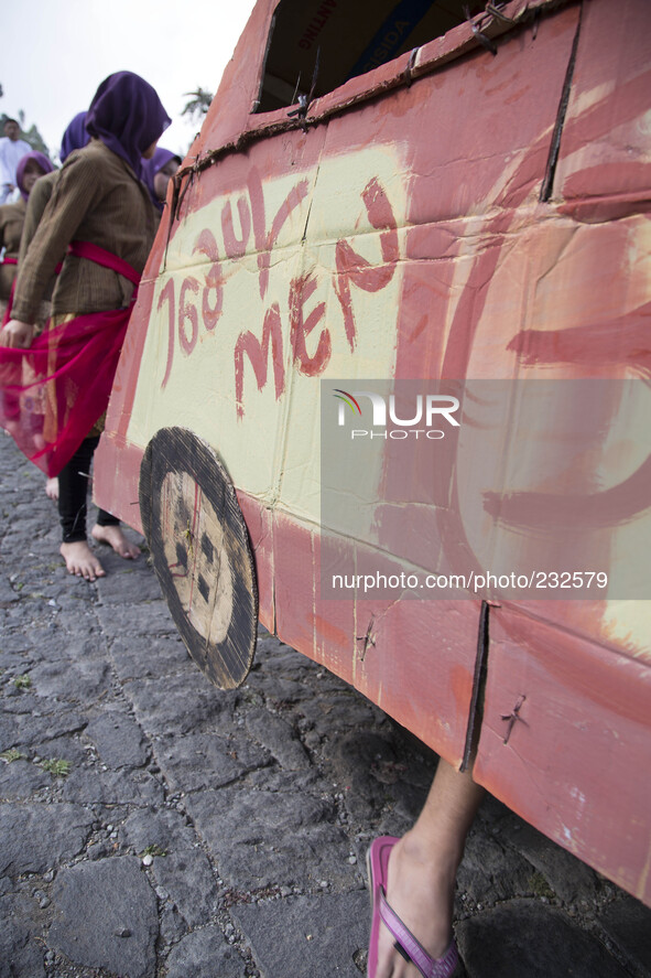 Bajaj transporation imitation during the Karnaval at Dieng. Dieng plateau in Central Java, is part of the district of Banjarnegara and Wonos...