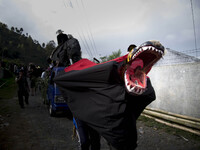 Participant with their dragon imitation style during the village karnval at Dieng. Dieng plateau in Central Java, is part of the district of...