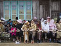 Women participant eating together after the karnivale festival at Dieng. Dieng plateau in Central Java, is part of the district of Banjarneg...