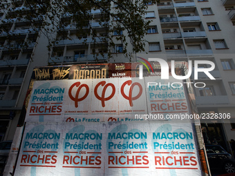 A poster of the 'France Insoumise' party on French President Macron reading 'Macron president of the wealthy'. More than 4000 protesters too...