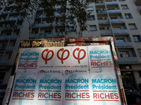 A poster of the 'France Insoumise' party on French President Macron reading 'Macron president of the wealthy'. More than 4000 protesters too...