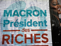 A poster of the 'France Insoumise' party on French President Macron reading 'Macron president of the wealthy'. More than 4000 protesters too...