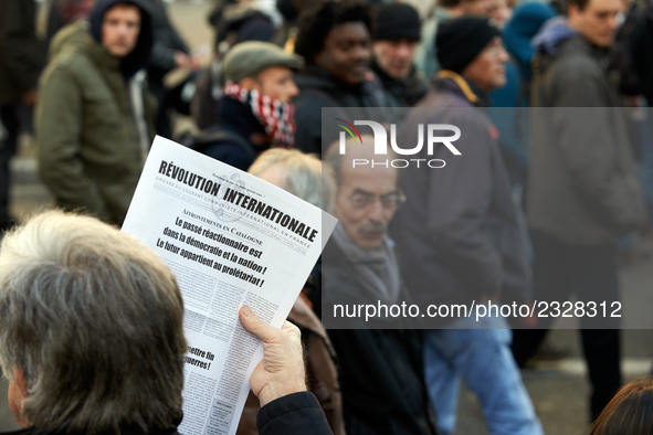 A man sells to protesters a newspaper called 'International revolution' with headlines on Catalonia. More than 4000 protesters took to the s...