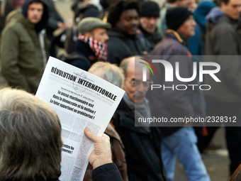 A man sells to protesters a newspaper called 'International revolution' with headlines on Catalonia. More than 4000 protesters took to the s...