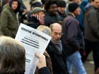 A man sells to protesters a newspaper called 'International revolution' with headlines on Catalonia. More than 4000 protesters took to the s...