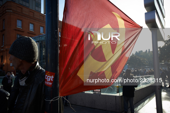 A communist flag on the side of the march. More than 4000 protesters took to the streets of Toulouse against the new Macron's reforms on the...