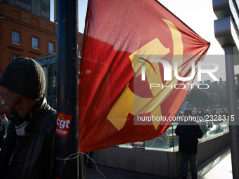 A communist flag on the side of the march. More than 4000 protesters took to the streets of Toulouse against the new Macron's reforms on the...