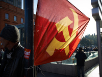 A communist flag on the side of the march. More than 4000 protesters took to the streets of Toulouse against the new Macron's reforms on the...