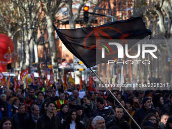 An anarchist flag during the protest. More than 4000 protesters took to the streets of Toulouse against the new Macron's reforms on the Work...